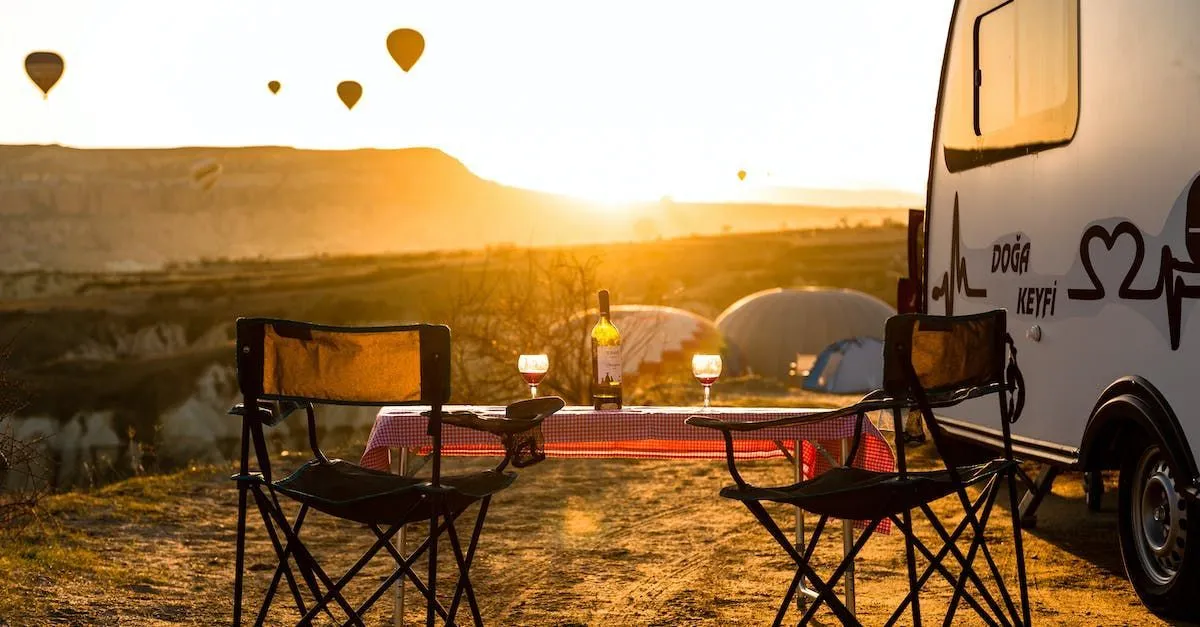 RV campsite at golden hour beside a wide open landscape